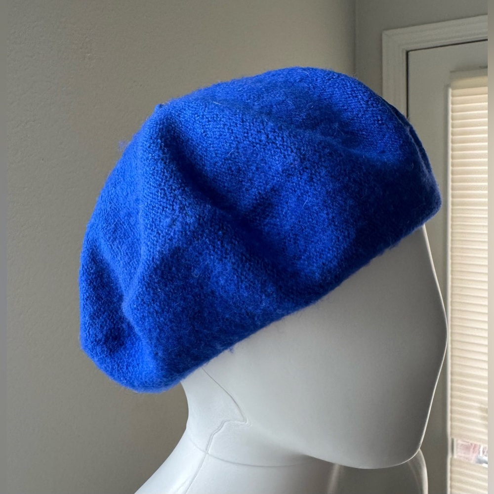 This 100% wool beret in royal blue is a stylish and functional accessory .